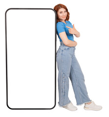 Pointing big huge blank screen mobile phone, full body young caucasian woman standing leaning pointing big huge blank screen mobile phone. Modern smartphone mock up. Isolated  transparent png.
