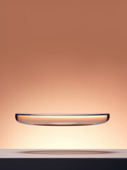 A glass bowl on top of a table, glass podium, pedestal.