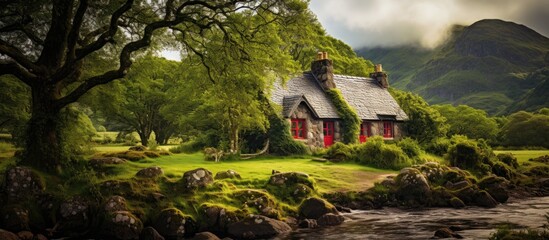 Charming Irish cottage in Killarney National Park With copyspace for text - obrazy, fototapety, plakaty