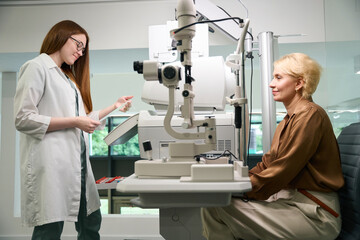 Elegant caucasian lady at an ophthalmologists appointment