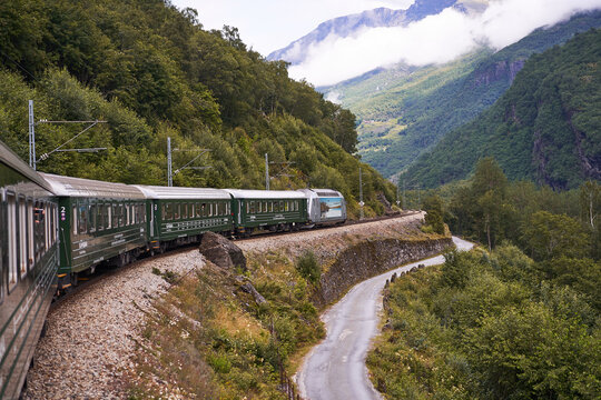 View from window at the Flamsbana train and beautiful nature of Norway, famous tourist attraction and most steep railroad in the world in beautiful norwegian mountains.