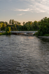 Naklejka premium Bridge over the Otter Tail River in the Summertime in rural Minnesota, United States. 