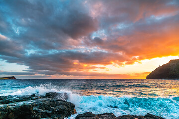 Serene Sunset over Majestic Ocean and Rocky Shoreline. Makapu'u beach of the Island of Oʻahu in...