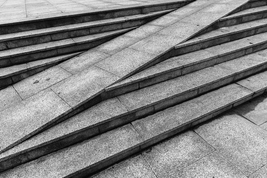 Fototapeta Gray stone stairs with a ramp, abstract urban architecture background photo