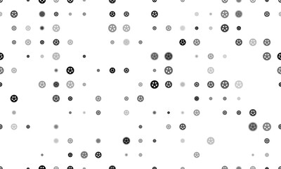 Seamless background pattern of evenly spaced black car wheel symbols of different sizes and opacity. Vector illustration on white background