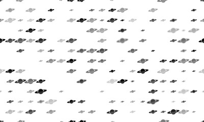 Seamless background pattern of evenly spaced black saturn symbols of different sizes and opacity. Illustration on transparent background