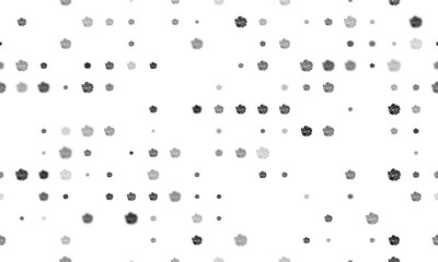 Seamless background pattern of evenly spaced black roses of different sizes and opacity. Vector illustration on white background