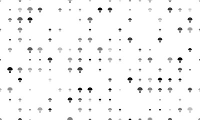Seamless background pattern of evenly spaced black mushroom symbols of different sizes and opacity. Illustration on transparent background