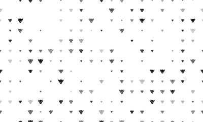 Seamless background pattern of evenly spaced black buffalo head symbols of different sizes and opacity. Vector illustration on white background
