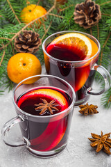 Mulled wine. Mulled wine against the background of a Christmas tree. New Year. Christmas tree. New Year's balls. Holiday. Christmas.