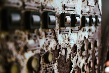 old and rusty control panel of a factory