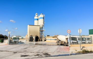 Batch factory mill. Ready mix concrete batching plant. Producing сoncrete and portland cement...