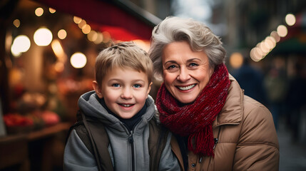 Winter Warmth, A Heartwarming Portrait of a Smiling Grandmother and Grandson at the Christmas Market