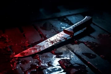 Fotobehang Scary conceptual image of a bloody knife on the table. The concept of committed murder, crime © Uliana
