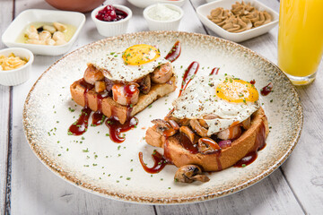 Delicious Fried Breakfast Eggs on White Plate, Traditional Tasty Toast with Bacon and Sauce, Gourmet Cuisine, Healthy Morning Meal