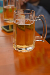 beer mug on wooden table alcoholic drink fun and leisure
