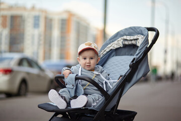 baby in a stroller 8 months, comfortable lightweight stroller for travel.