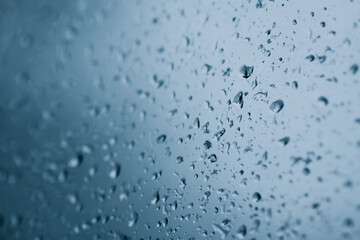 Misty window glass. Wet window background.