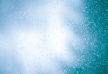 Misty window glass. Wet window background.