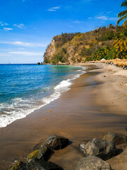 Caribbean island beach with rocks and waves, dry season, March, St. Lucia, West indies