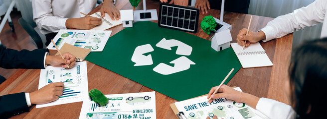Group of business people planning and discussing on recycle reduce reuse policy symbol in office...