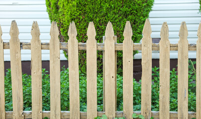wooden fence in a serene countryside setting, bathed in warm sunlight, evoking nostalgia and the...
