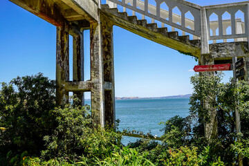View to the bay under an old walkway on Alcatraz Island, San Francisco, California.