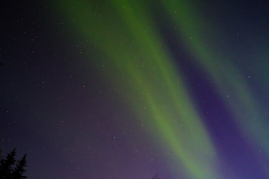 The Stars and Northern Lights seen like rays of beam in Fairbanks , Alaska