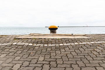 Heavy cement structure for mooring ships in the sea port of the city of Salvador, Bahia.