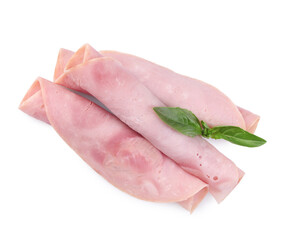 Rolled slices of tasty ham and basil isolated on white, top view