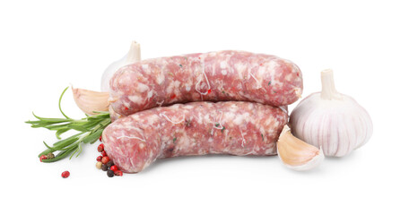 Raw homemade sausages and different spices isolated on white