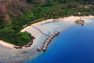 aerial view of fiji resort island on the water