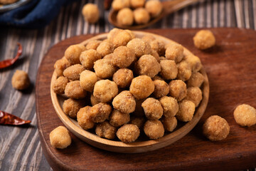 flavored peanuts or crunchy Peanut in a plate on table.