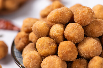 flavored peanuts or crunchy Peanut in a plate on table.
