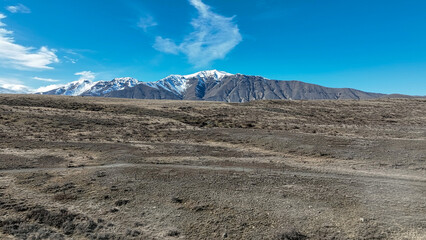 Drone mountain and farming country views of the shores of Lake Tekapo  area near  Roundhill Ski area