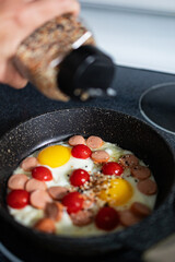 fried eggs in a frying pan
