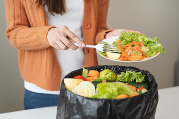 people put bio trash from food waste in domestic homes to compost bins to make fertilizer to reduce global environmental pollution.