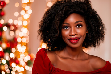 Christmas portrait of a middle-aged black woman in a red dress