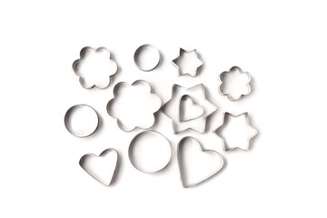 Different cookie cutters isolated on white background - obrazy, fototapety, plakaty
