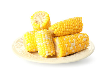 Plate with boiled corn cobs on white background