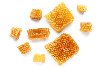 Sweet honeycombs on white background