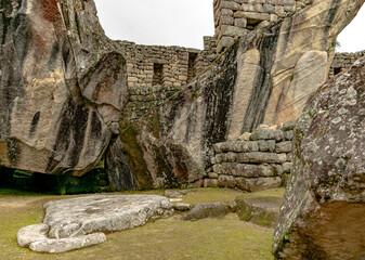 Temple of the Condor at Machu Picchu Archeological ancient rock formation. stands a formation that was adapted and shaped to be the wings of a huge bird.
