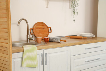 Counters with sink and utensils in kitchen