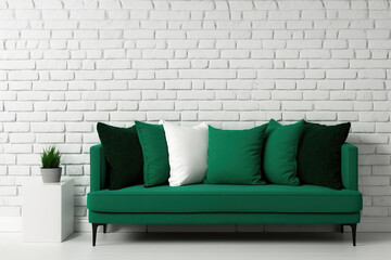 Empty white brick wall with green sofa pillows. Design mockup. Generative AI