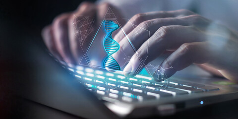 Fototapeta premium DNA analysis in the form of a projection in front of a laptop.