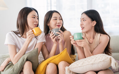 Portrait of young beautiful asian woman group hands holding coffee cup gossip morning time in...