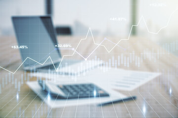 Multi exposure of virtual abstract financial diagram on calculator and pc background, banking and accounting concept
