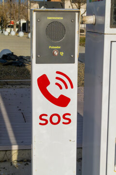 Rio Gallegos, Argentine - May 26, 2023 : an SOS emergency button with a city speaker, with a characteristic image of a telephone and the capital letters of the distress signal