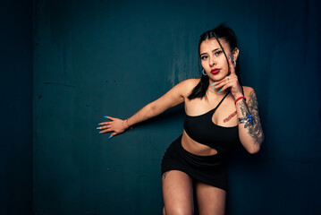 portrait of a beautiful young woman posing next to a large copy space.