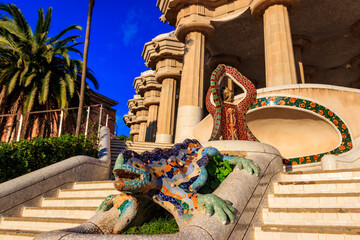 Multicolored mosaic dragon salamander of Gaudi in Park Guell, Barcelona, Spain